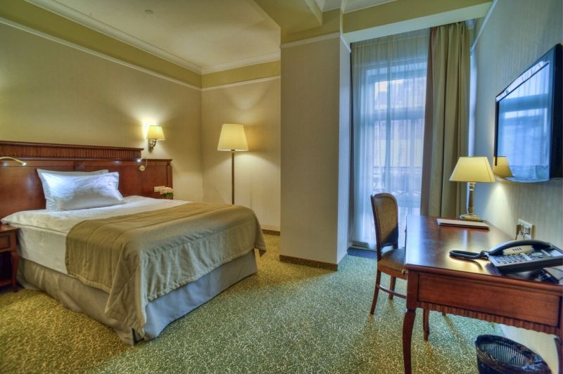 Room photo placeholder showing a clean, simple standard room layout